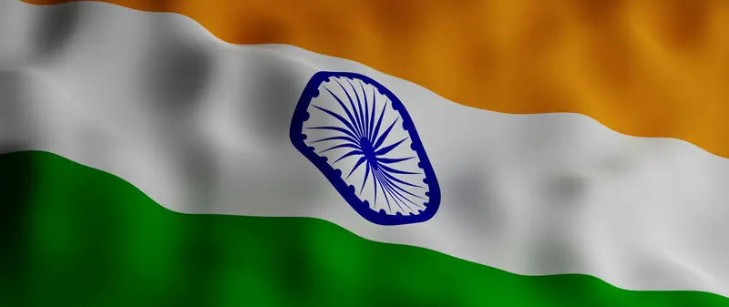 Waving Indian national flag with saffron, white and green bands and the blue Ashoka Chakra
