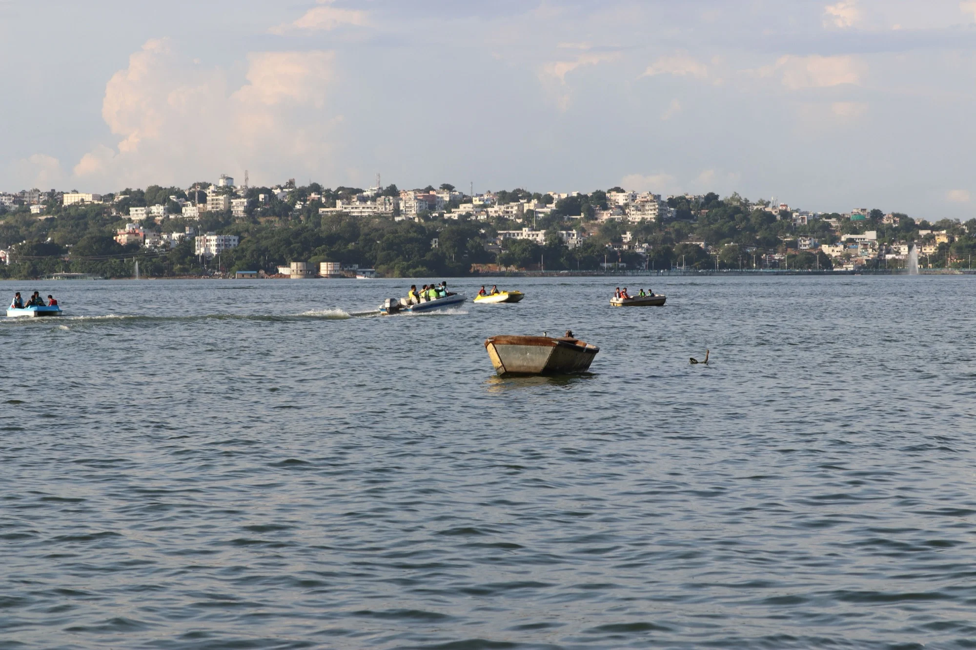 Boats on the Upper Lake in Bhopal with the city on the far shore