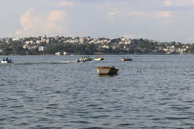 Boats on the Upper Lake in Bhopal with the city on the far shore
