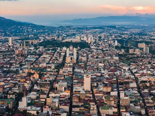 Aerial view of San Jose, Costa Rica, with mountains behind the city