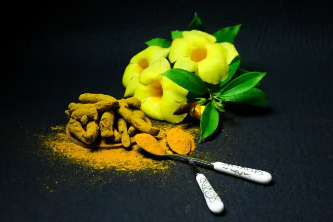 Turmeric roots and powder, a healing ingredient named in ancient Indian medical texts