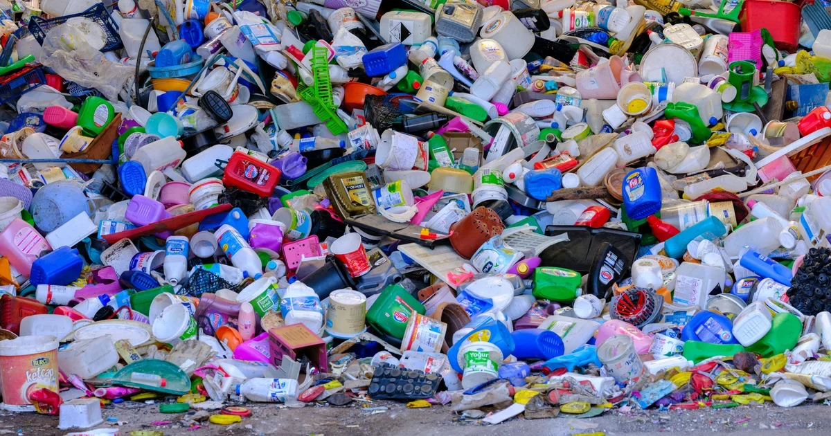 Large heap of used plastic bottles and containers sorted at a recycling centre