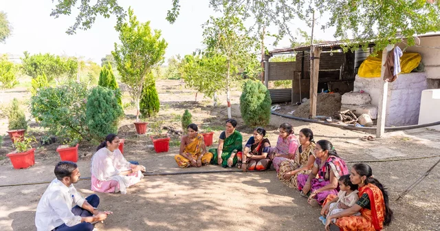 A group of villagers gathered for a community meeting in rural Nagpur, Maharashtra
